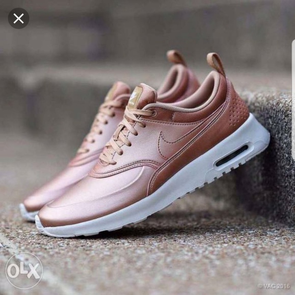 nike thea gold